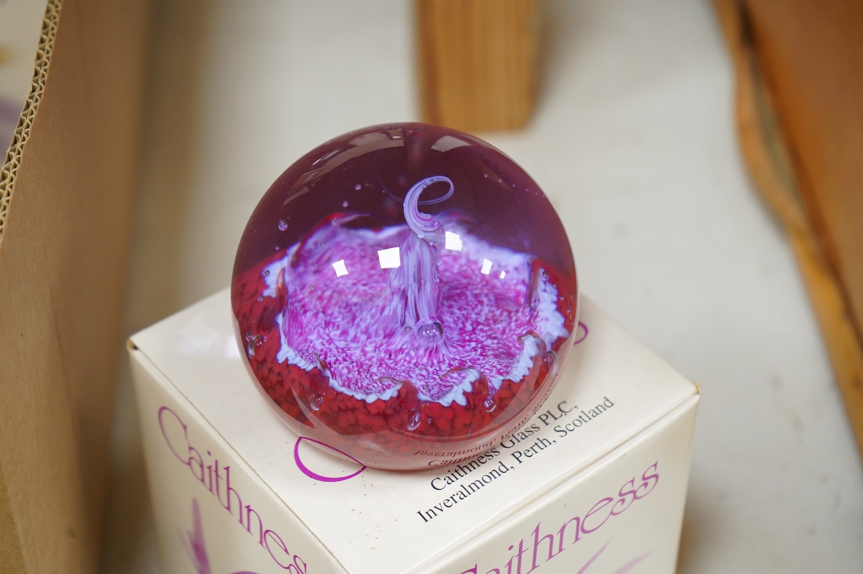 A collection of Caithness glass paperweights